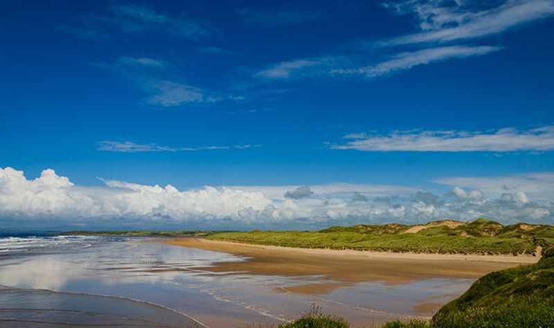 Beautiful beach with sand dunes at Bundoran County Donegal Ireland a popular place with surfers when the weather is right