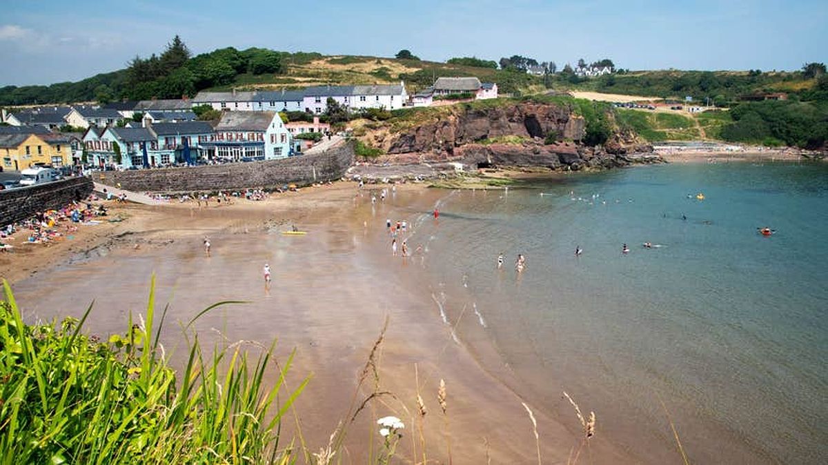 Clear water and golden sand at Dunmore East, Waterford