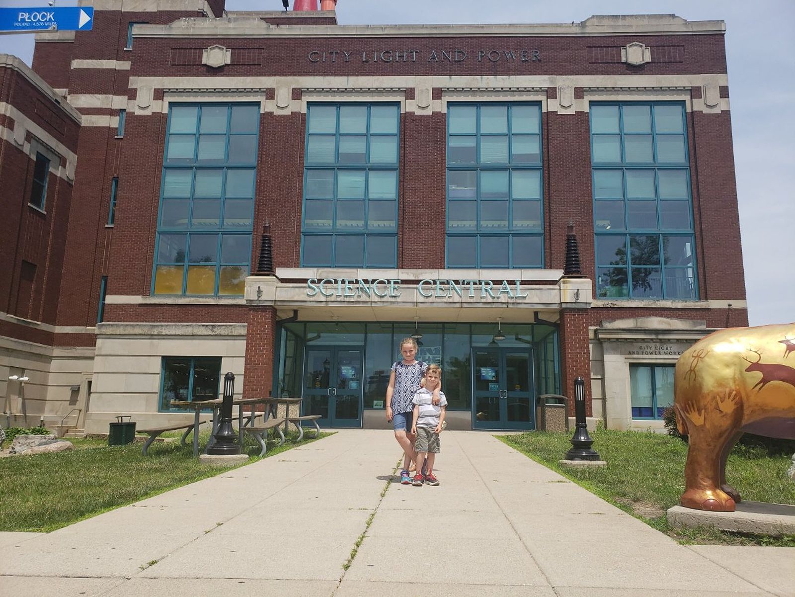 Two children standing in front of Science Central