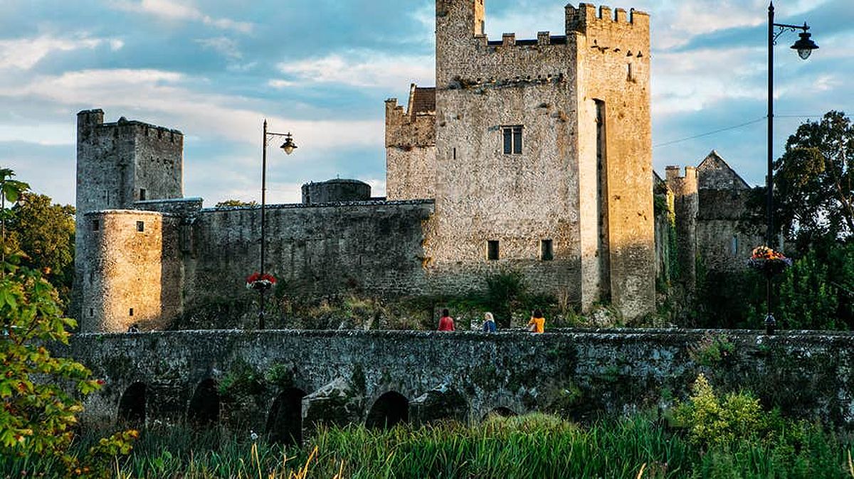 Visitors walking to Cahir Castle