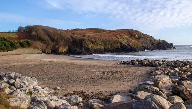 Warren Beach with stunning backdrop and tranquility